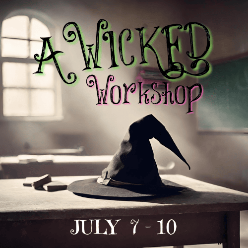 A witch's hat on a table with A Wicked Workshop title.