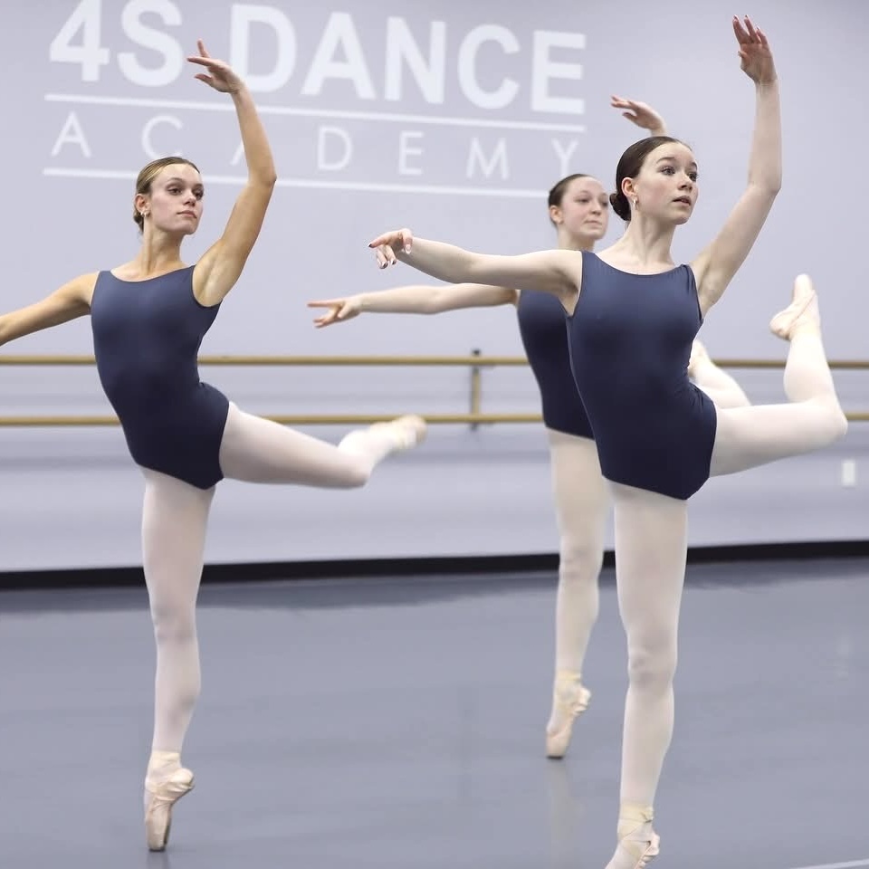Three ballet dancers.
